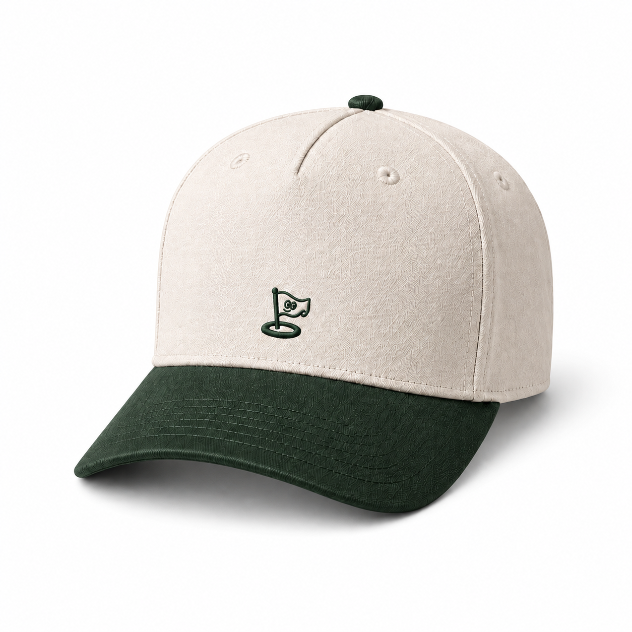 The Flag Cap in cream and forest, front three-quarter view